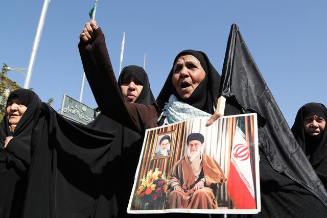 Iranian women protest against Saudi Arabia following the deaths of 131 Iranian pilgrims in a stampede at the annual Hajj