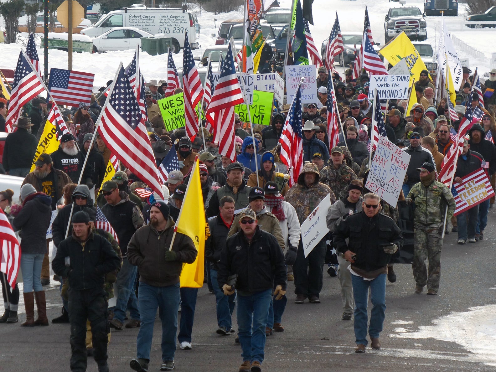 Protesters march on Court Avenue in support of an Oregon ranching family facing jail time for arson in Burns, Oregon, January 2, 2016