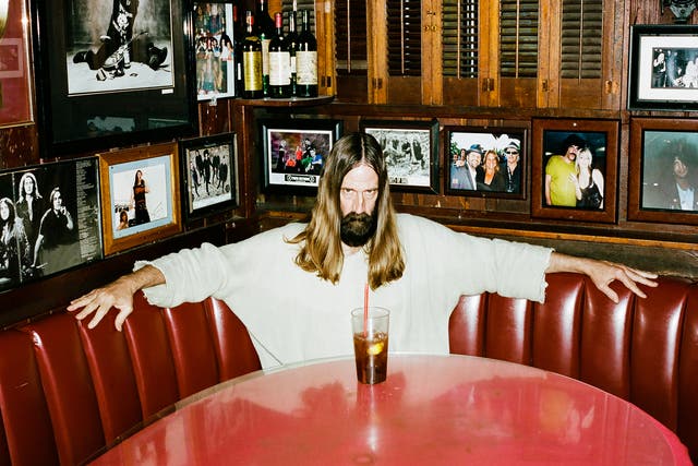 Hollywood Jesus enjoys a well-earned beverage in a Los Angeles bar (Photo: Roo Lewis)