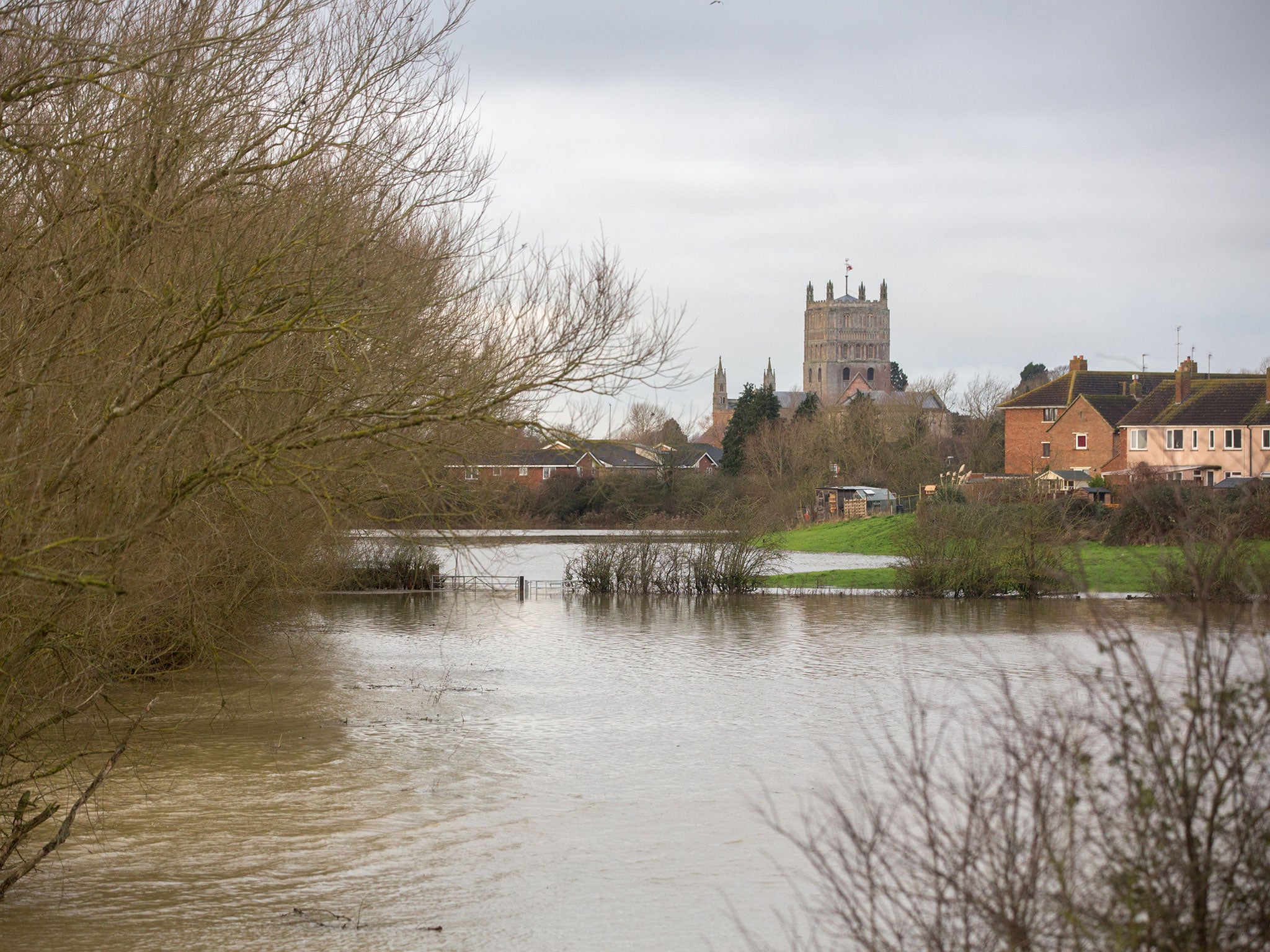 Flood water sits around Tewkesbury Abbey after weeks of heavy rain