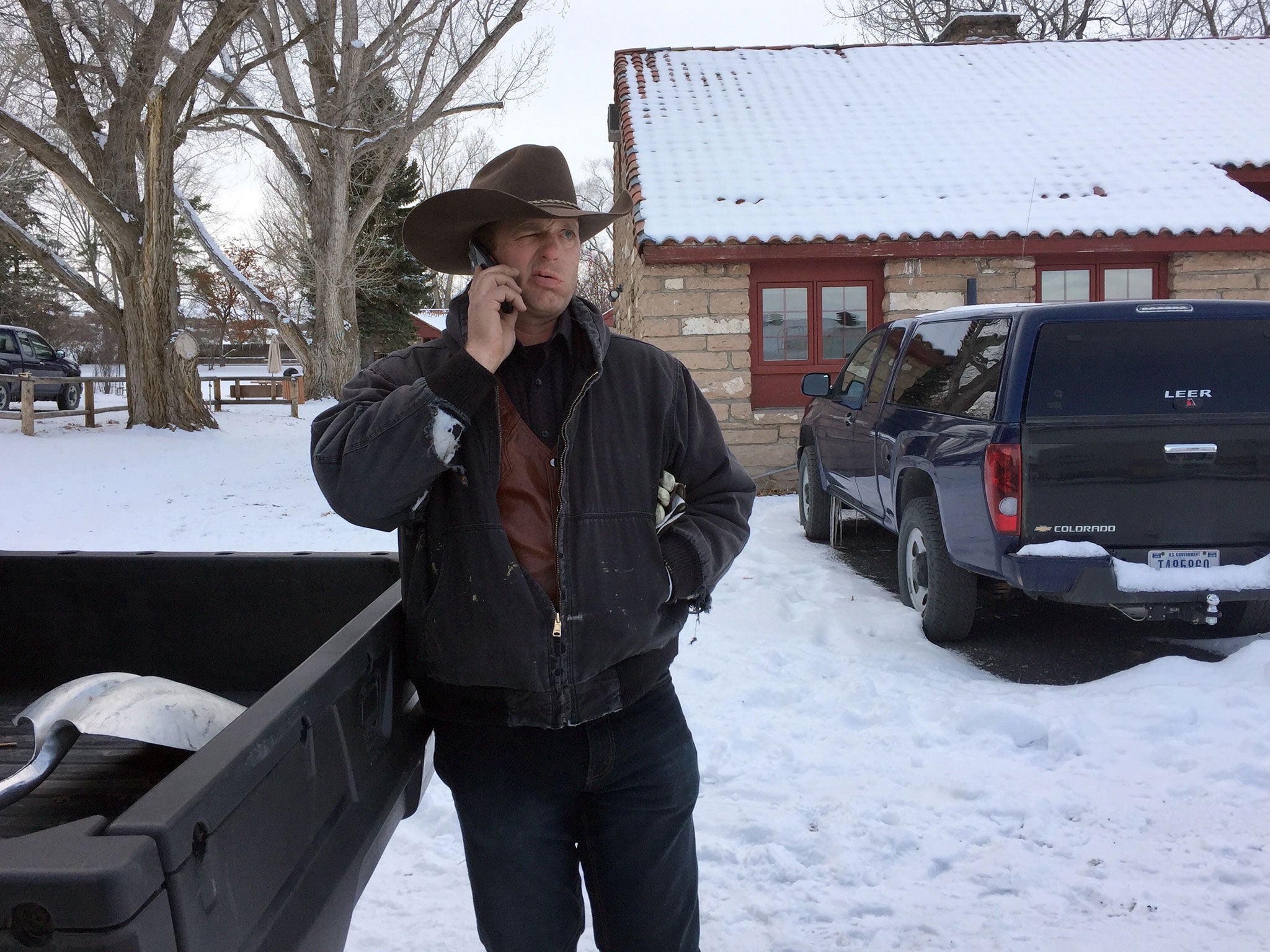 Ryan Bundy talks on the phone at the Malheur National Wildlife Refuge near Burns, Oregon. Bundy is one of the protesters occupying the refuge to object to a prison sentence for local ranchers for burning federal land