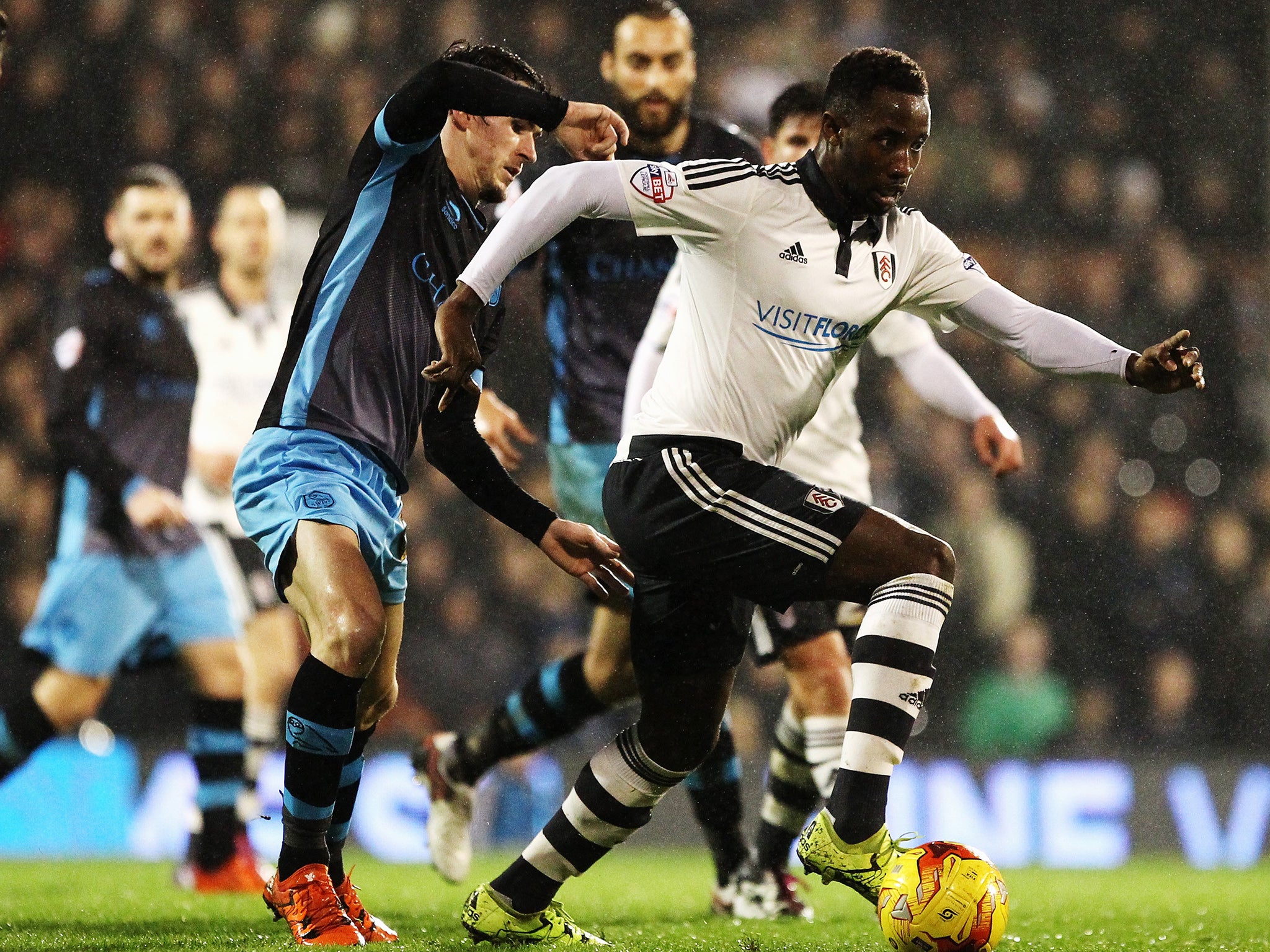 Fulham striker Moussa Dembele (right) could be on his way to White Hart Lane