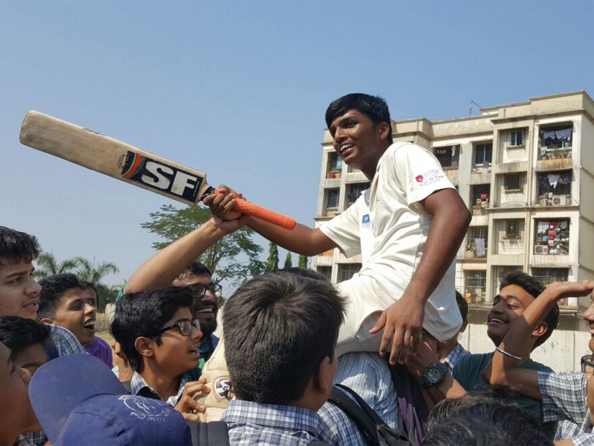 Pranav Dhanawade celebrates his incredible innings