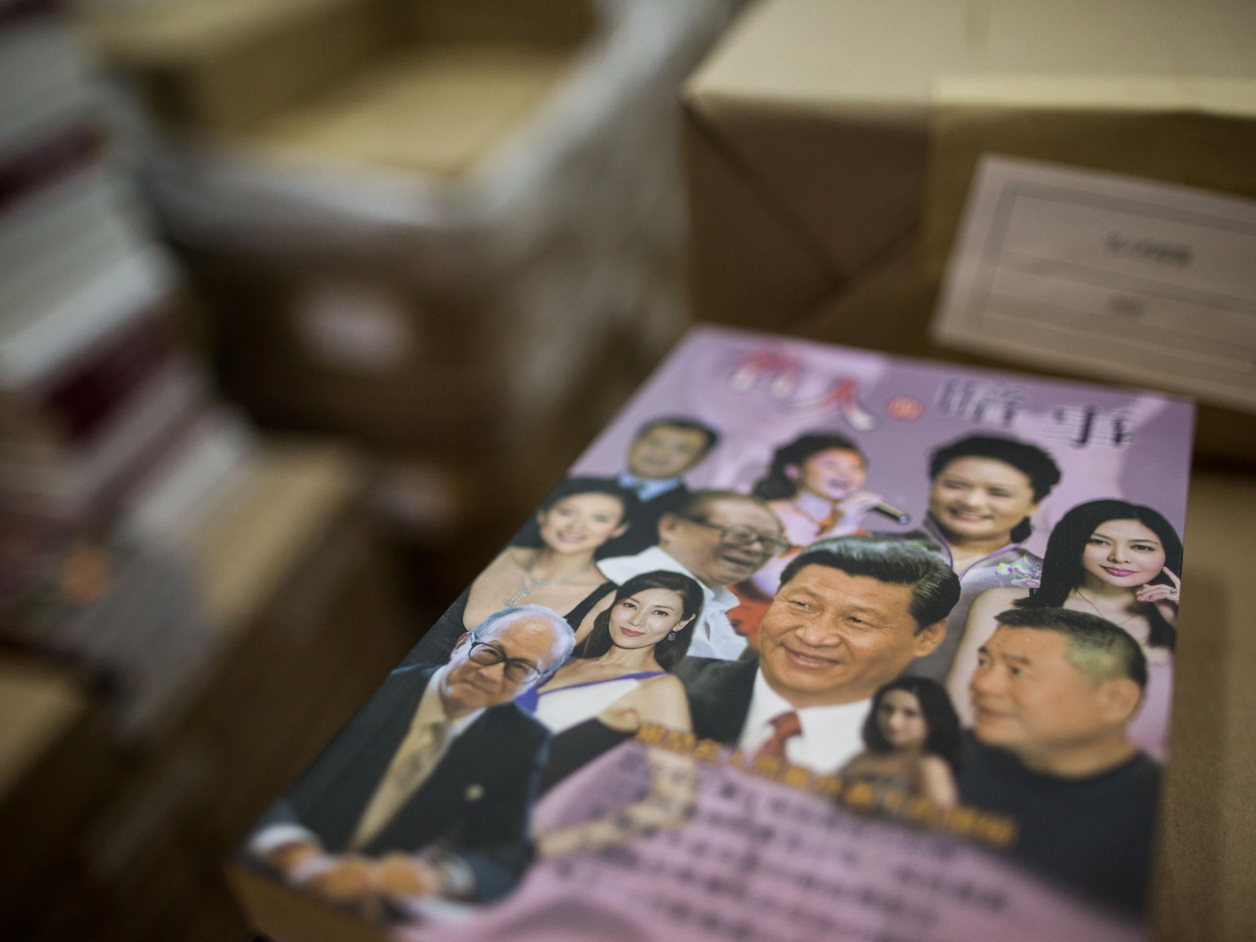 A book with Chinese President Xi Jinping is displayed at the warehouse of Hong Kong-based publisher Mighty Current in Hong Kong
