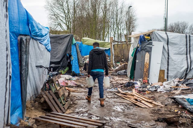 A refugee in the Calais Jungle on Christmas Day