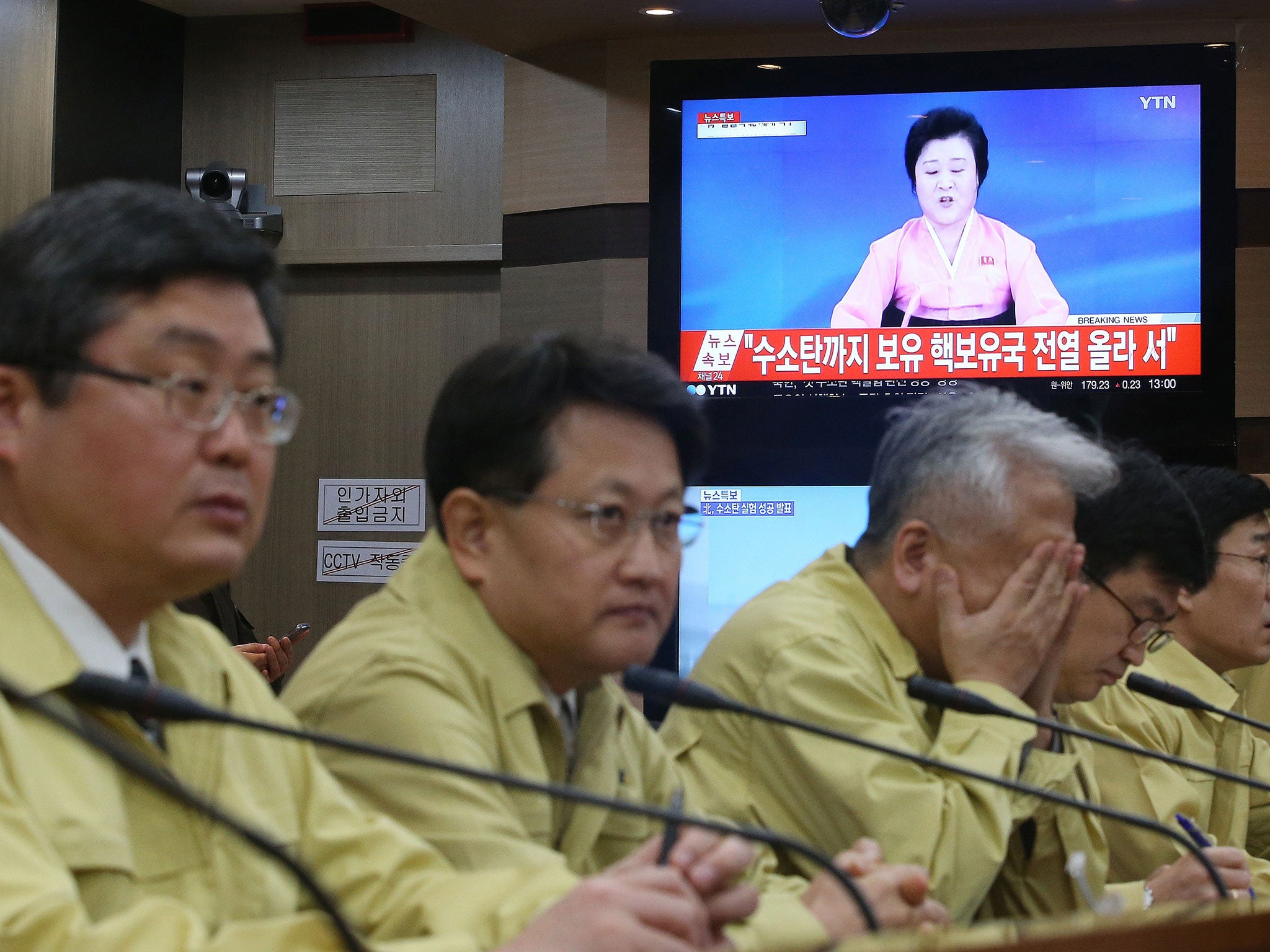 South Korean Foreign Ministry officials attend an emergency meeting after the announcement