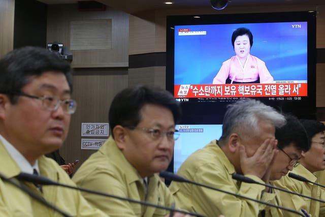 South Korean Foreign Ministry officials attend an emergency meeting after the announcement