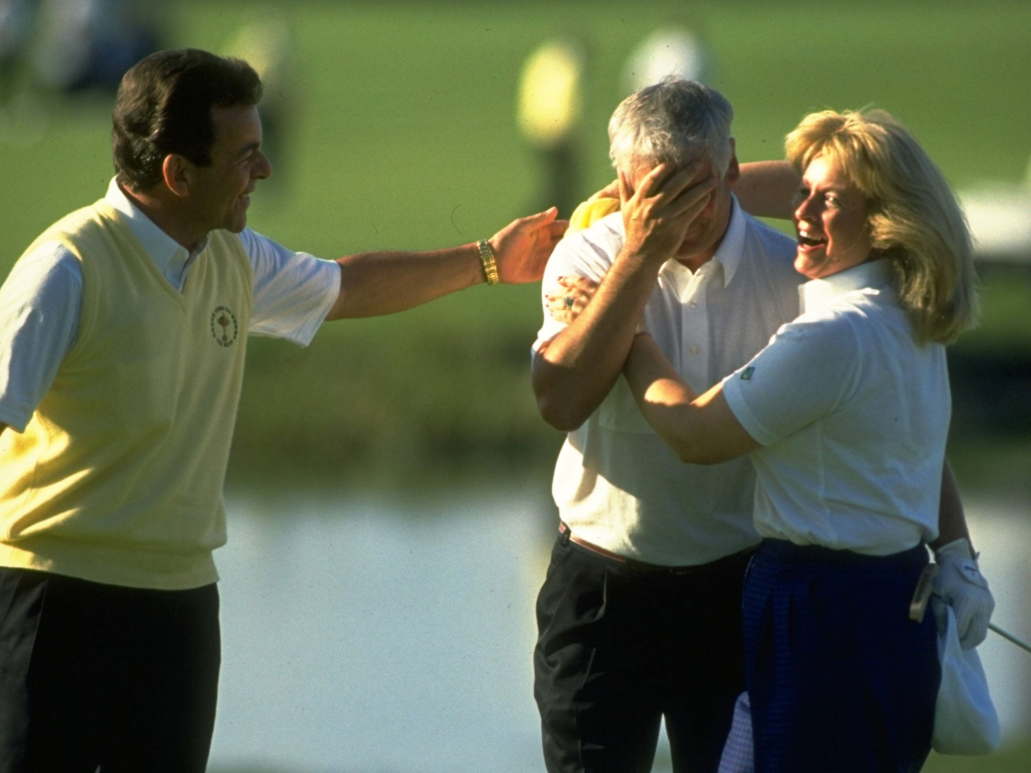 Christy O''Connor Jnr of the European team is congratulated captain Tony Jacklin and his wife after victory over the USA in the Ryder Cup at the Belfry in 1989