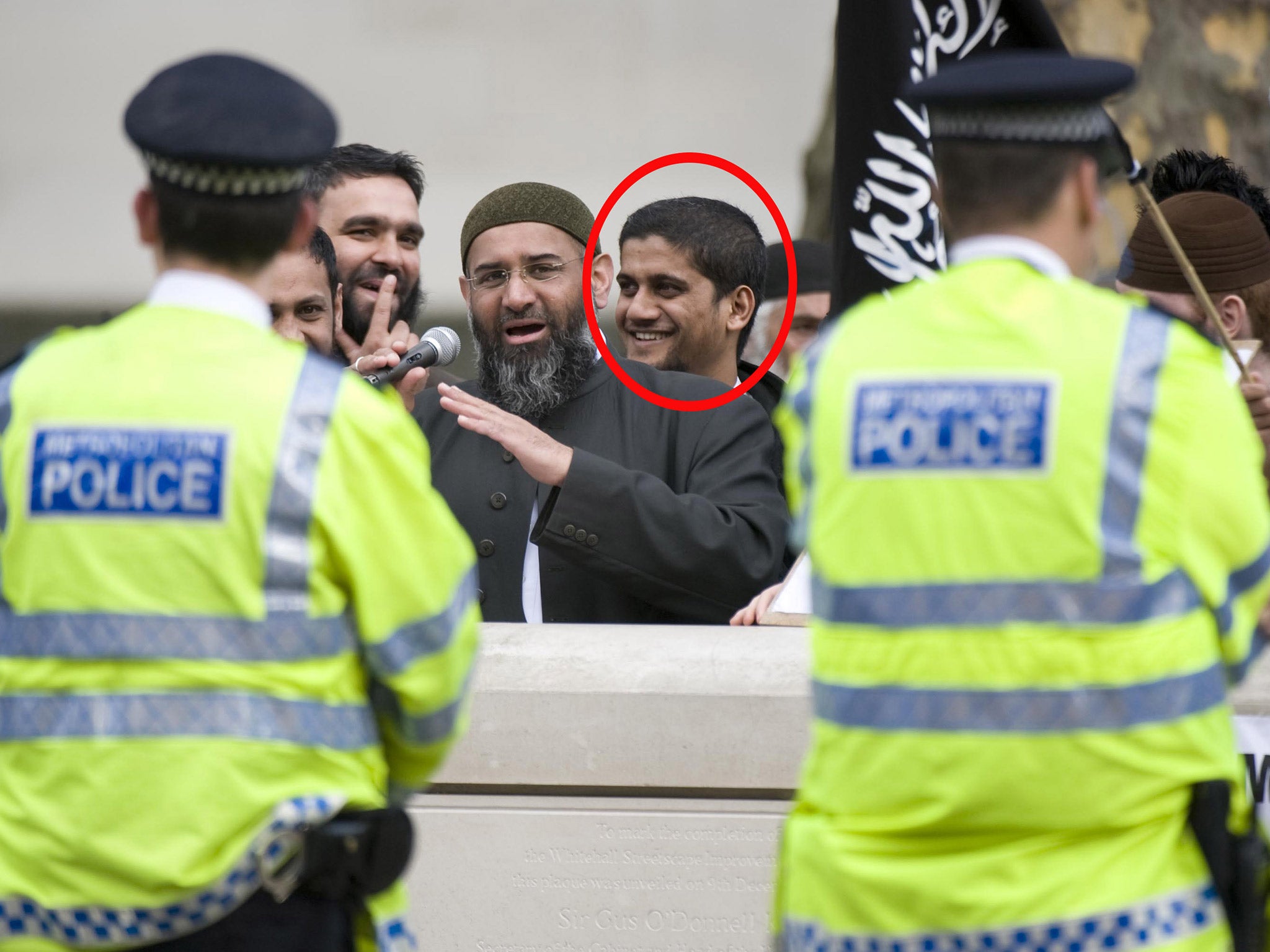 Siddhartha Dhar, circled, at an Al Muhajiroun rally in 2011 (Rex)