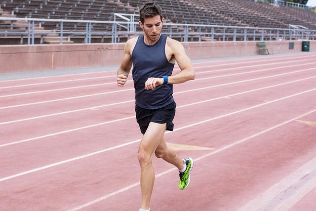 Fitness trackers monitor your steps around the running track