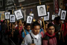 Mexican cartel members who 'flayed boy's face off and gouged his eyes out' arrested in hunt for 43 missing students