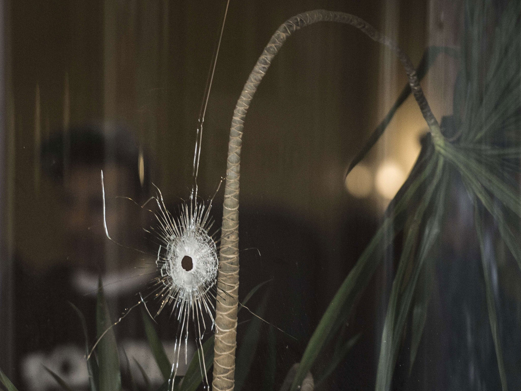 A damaged window at the Three Pyramids hotel in Cairo's al-Harm district on January 7, 2016