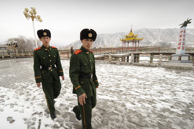 Chinese border guards patrol the Tumen river on the border with North Korea