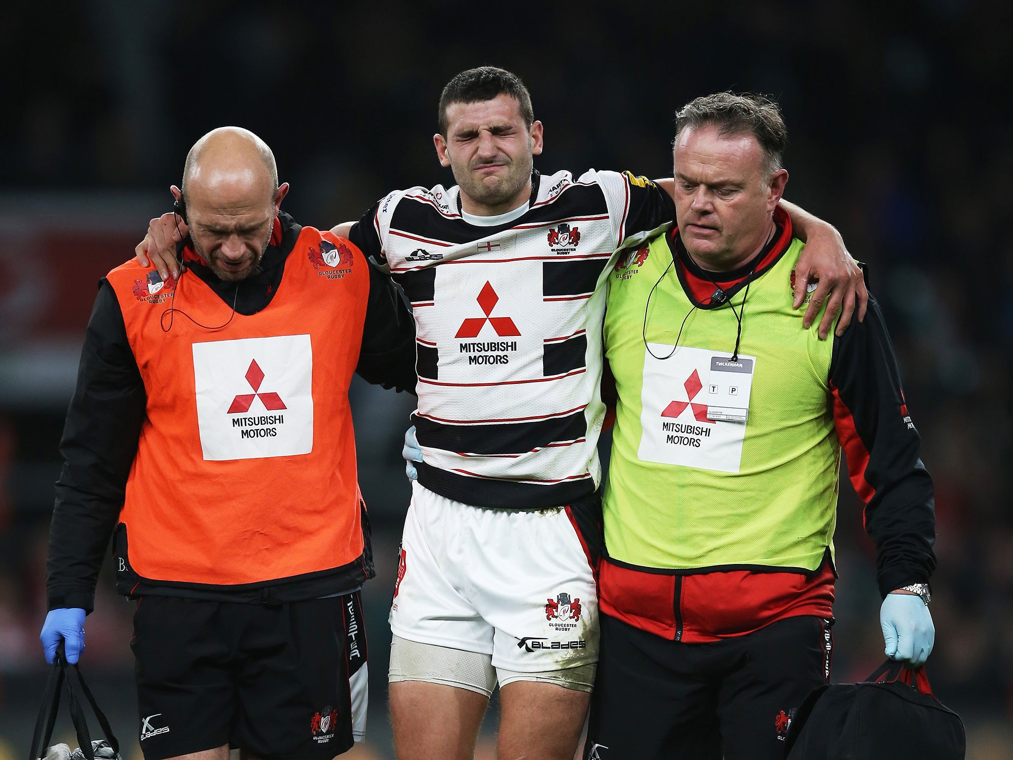 Jonny May limps off during Gloucester's Aviva Premiership encounter with Harlequins
