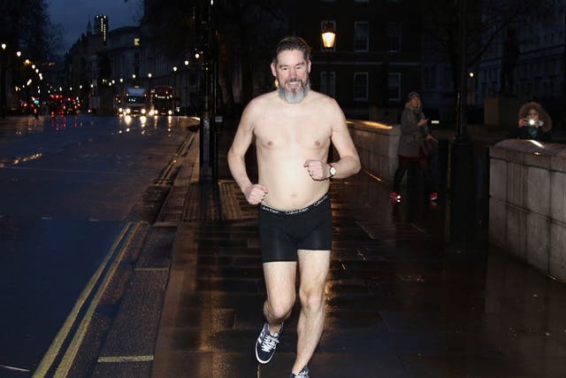 Daily Telegraph political journalist Dan Hodges streaks down Whitehall, London, after losing a bet for underestimating the Ukip's influence during the 2015 general election
