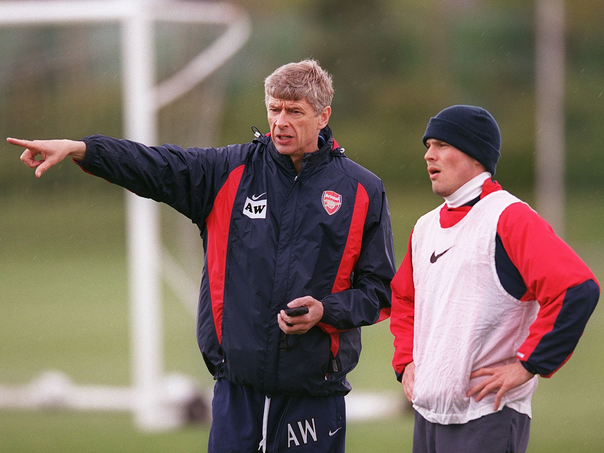 Arsene Wenger and Freddie Ljungberg during Arsenal training in 2003