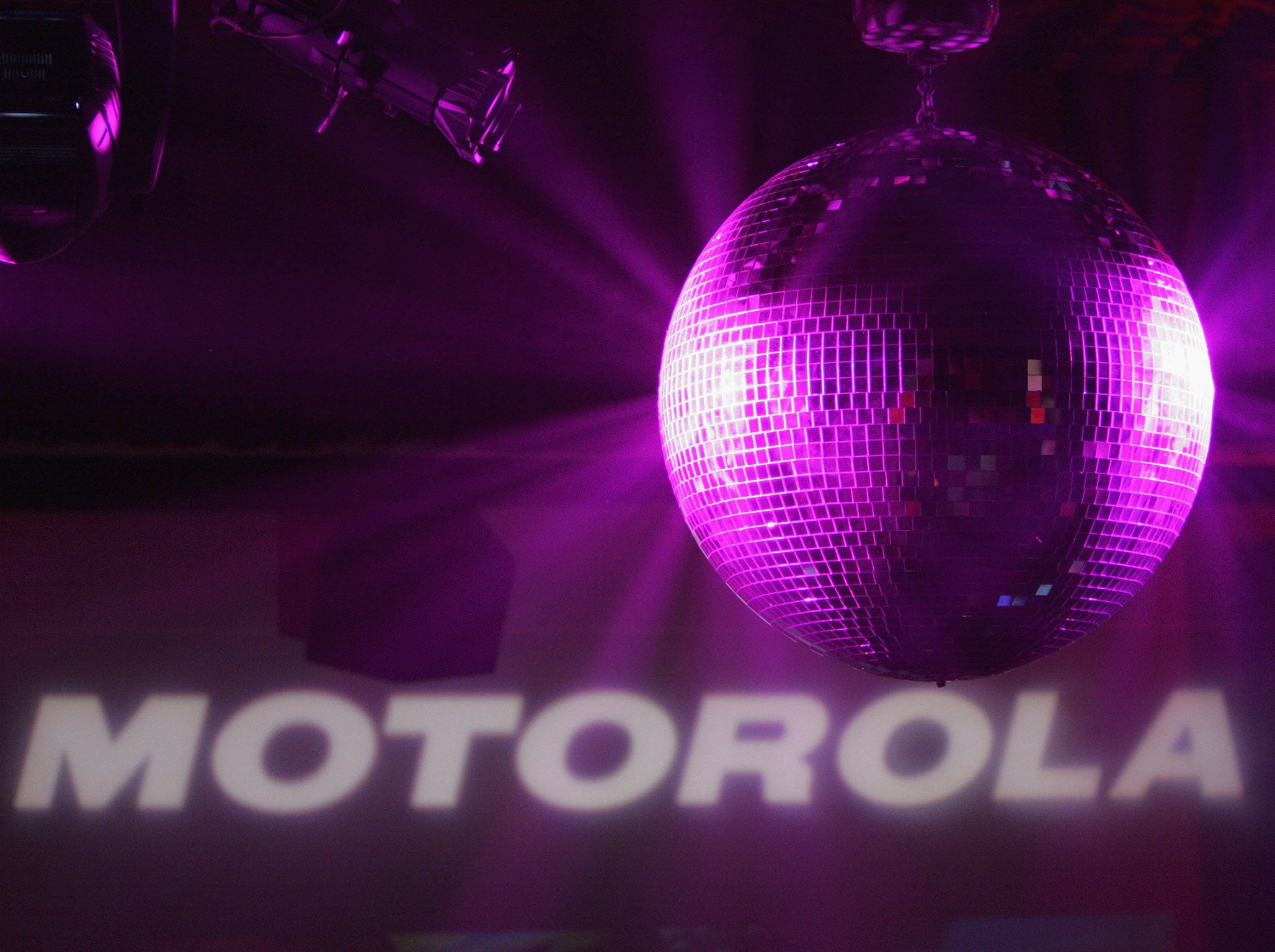A disco ball shines inside the Music Box Theatre where Motorola hosted their sixth anniversary party