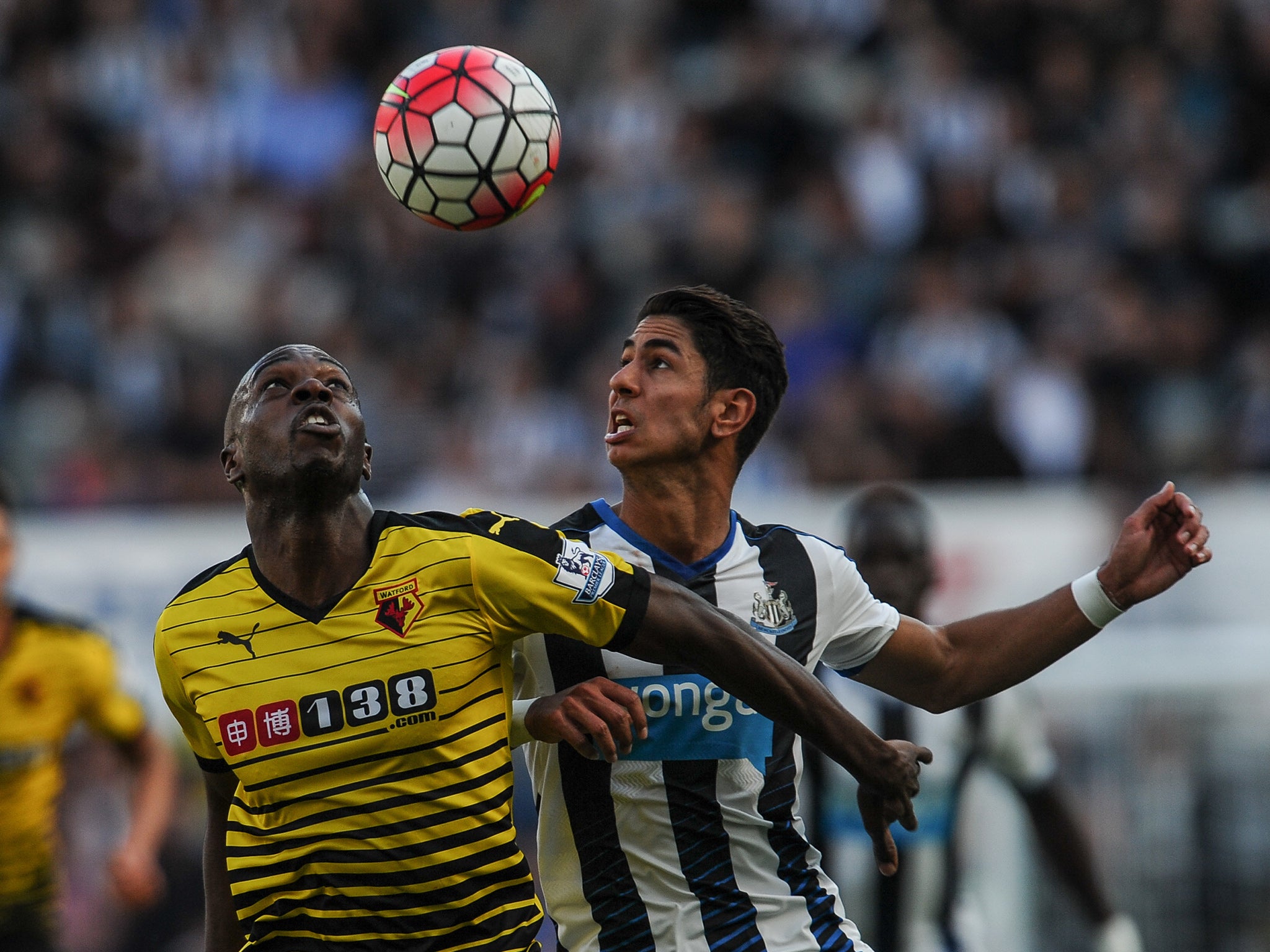 Allan Nyom and Ayoze Perez compete for the ball