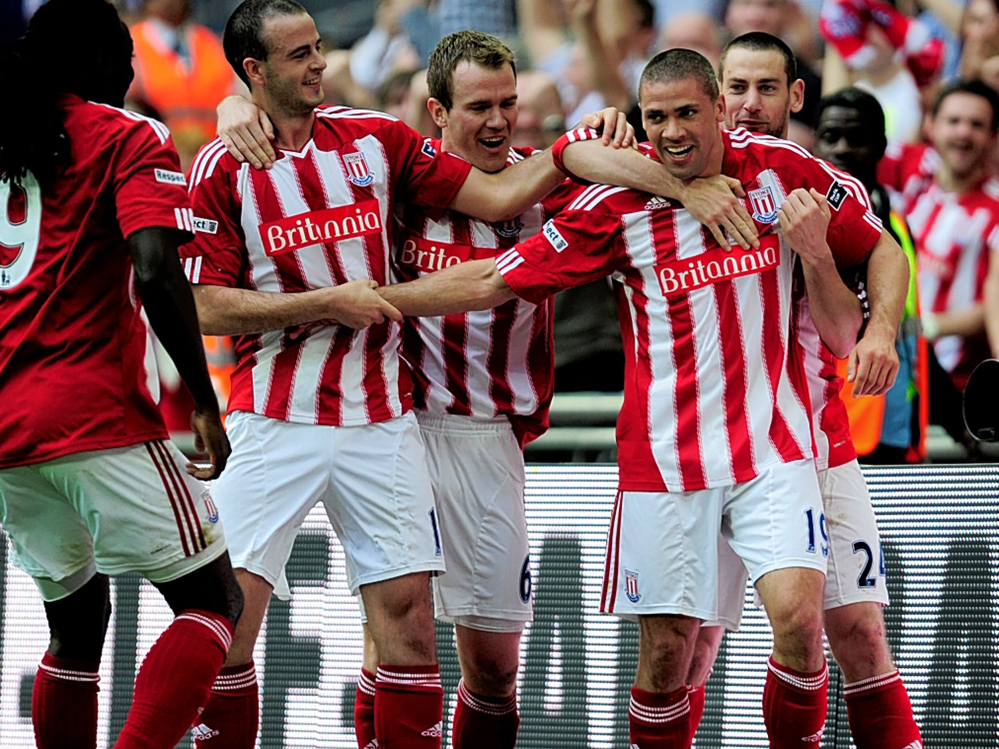 Jonathan Walters (second right) is congratulated after scoring Stoke’s fourth goal in the 5-0 win over Bolton in the FA Cup semi-final at Wembley in 2011