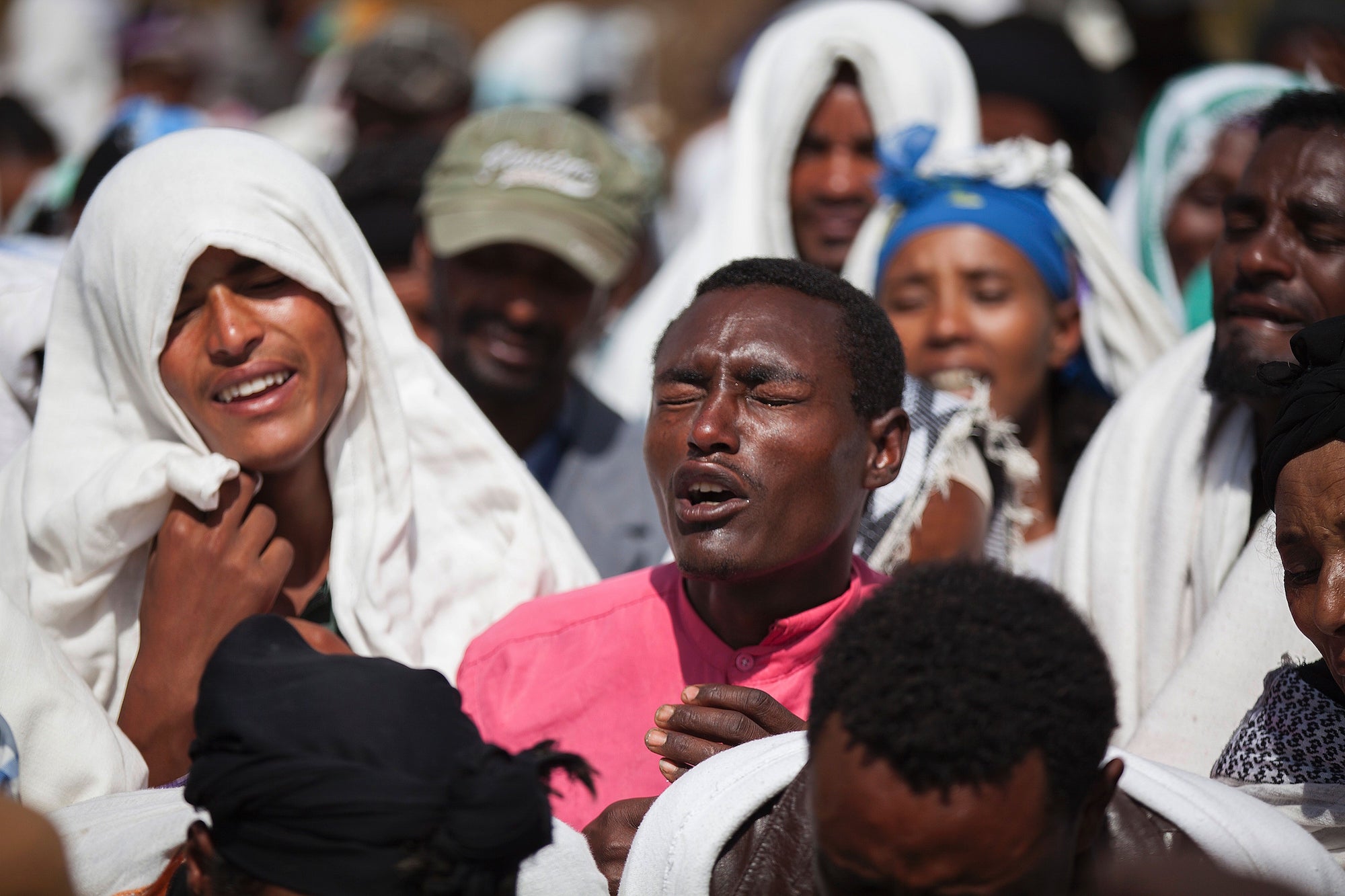 People mourn Dinka Chala's death in Yubdo Village. Zacharias Abubeker/Getty