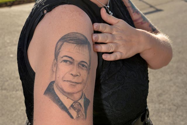 Ukip party supporter Kerrie Webb displays her Nigel Farage tattoo during the Ukip Annual Conference at Doncaster Racecourse