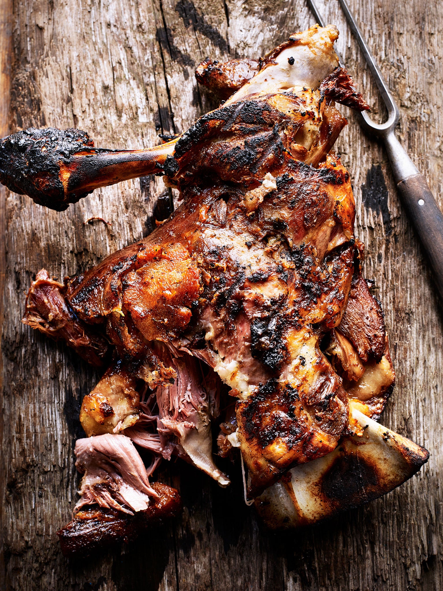 Slow-cooked lamb shoulder with anchovies, lemon, garlic and thyme (Kris Kirkham)