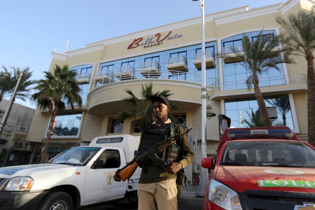 A member of the Egyptian security stands guard in front of the entrance to Bella Vista Hotel in the Red Sea resort of Hurghada, Egypt, January 9, 2016.