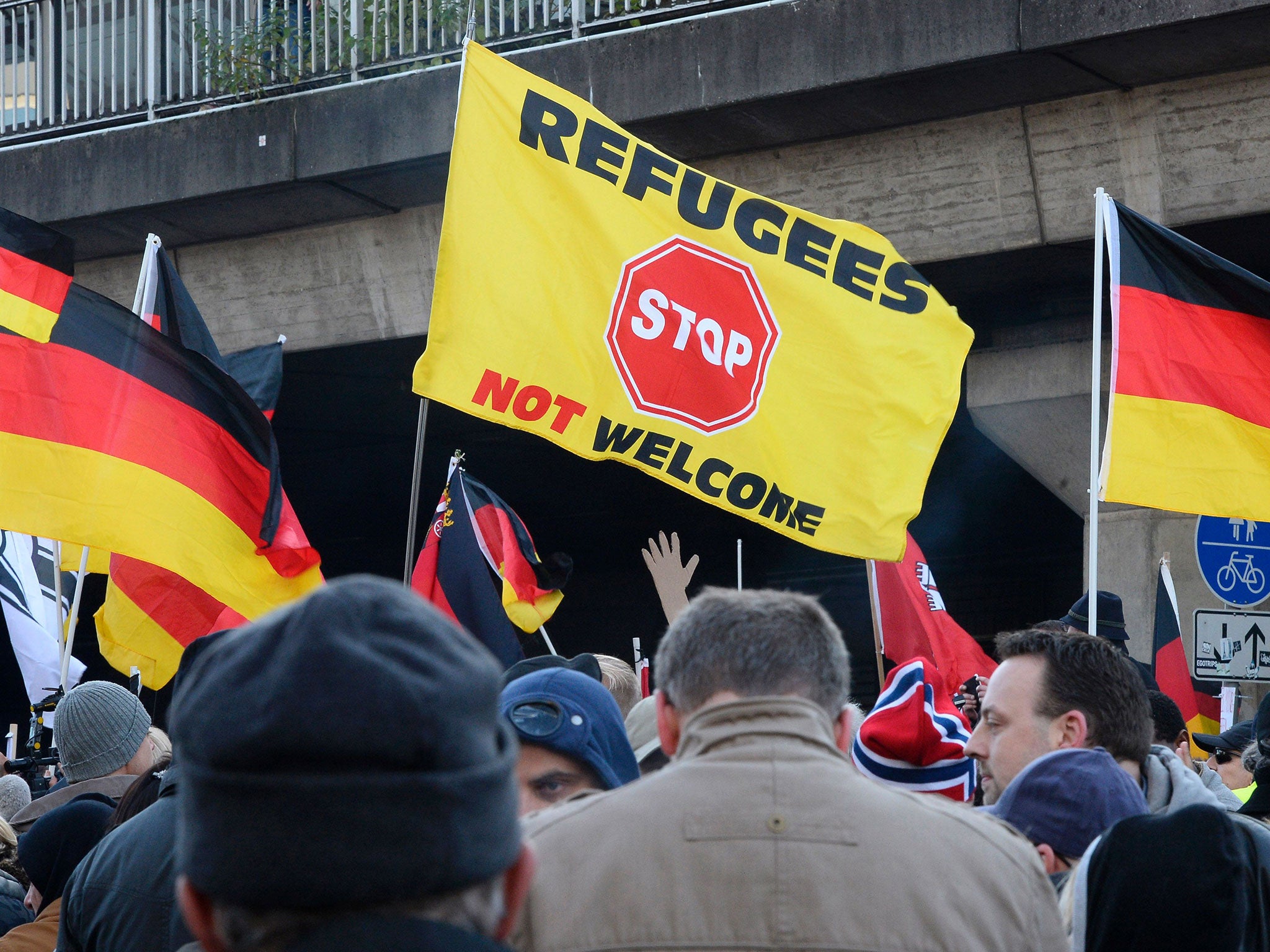German far-right supporters demonstrate at Cologne`s train station