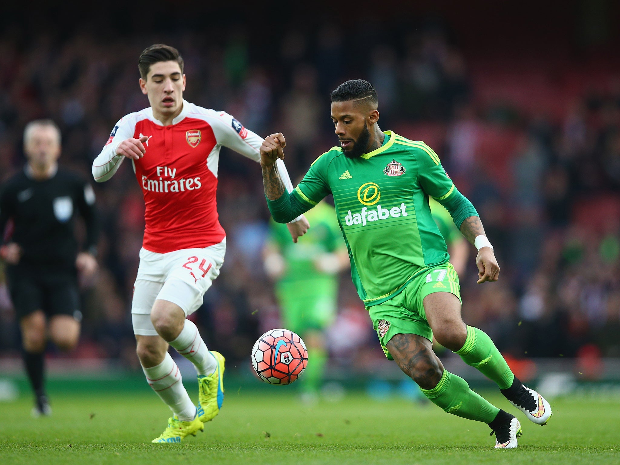 Jeremain Lens takes the ball past Hector Bellerin