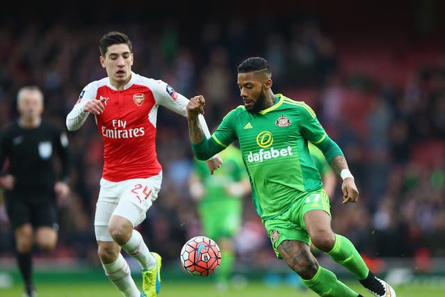 Jeremain Lens takes the ball past Hector Bellerin