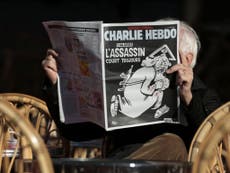 Charlie Hebdo cartoon depicts Aylan Kurdi as 'ass groper in Germany'