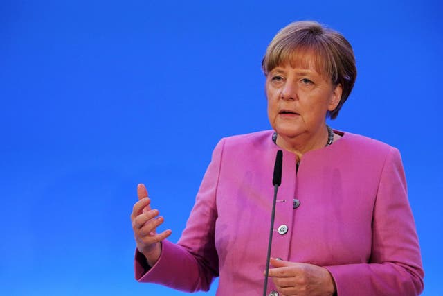 Angela Merkel has rejected calls for the closure of Germany’s borders with Berlin Wall-style defences (