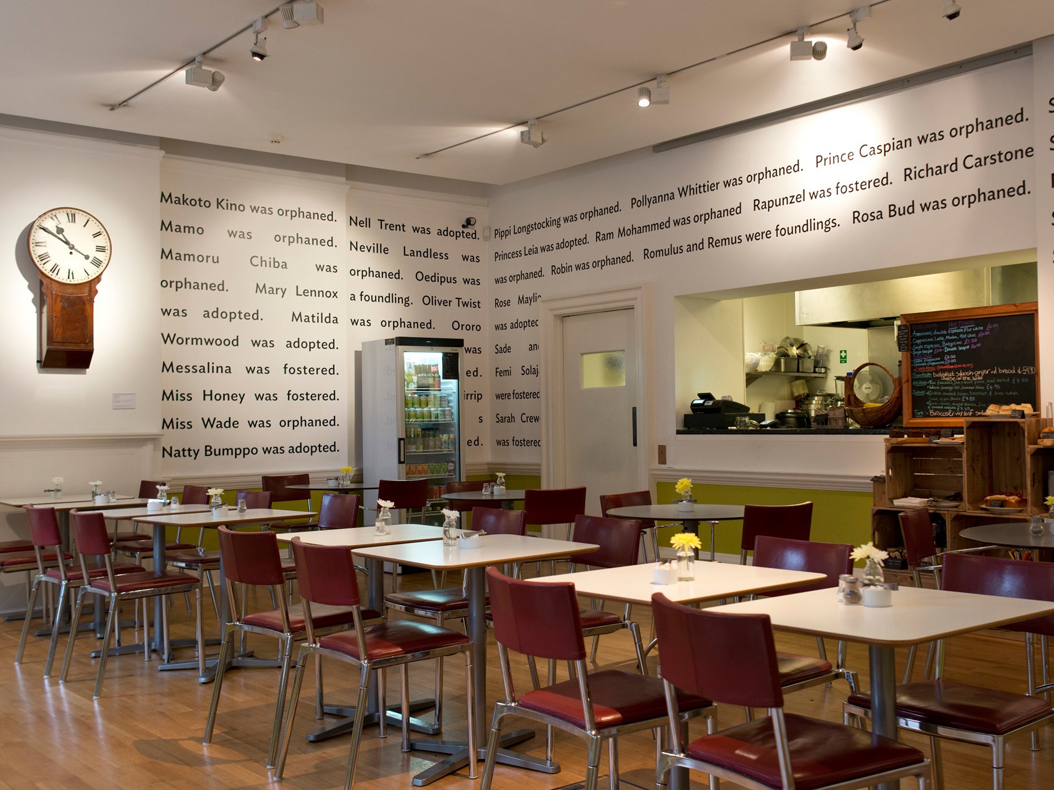 Lemn Sissay’s poem, 'Superman was a Foundling', on the walls of the museum café