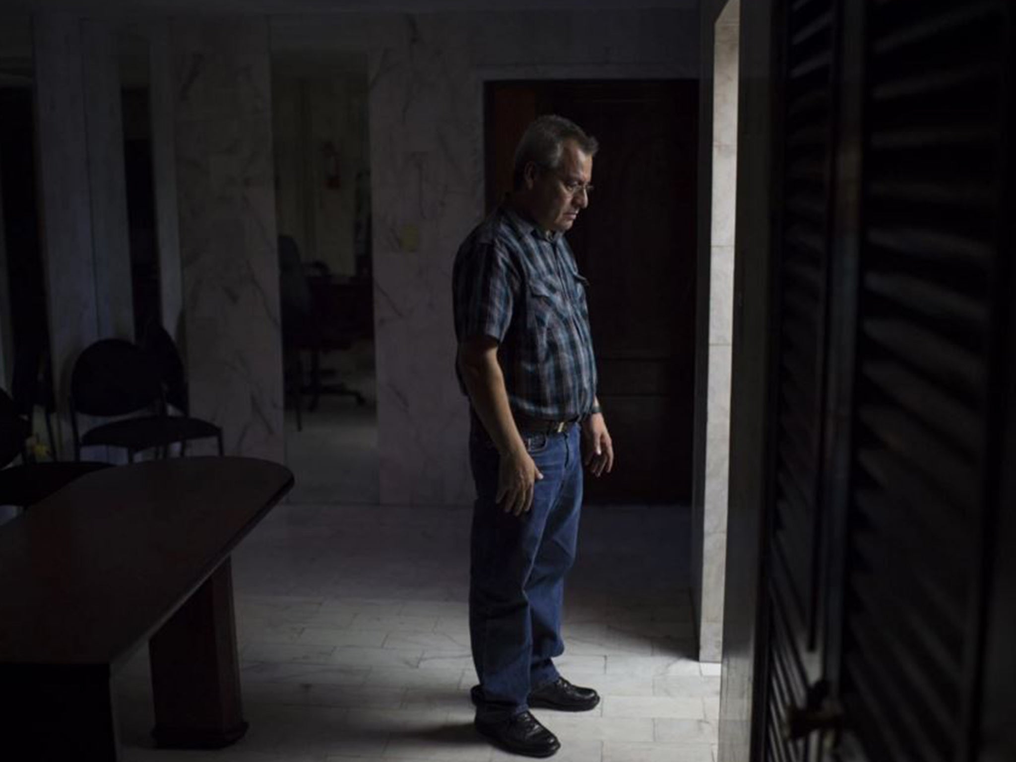 Enrique Juarez, an editor who was kidnapped over a story the cartel did not like, is shown in the El Mañana office in Reynosa, Mexico, in October