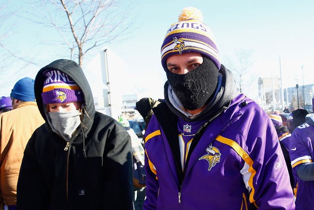 Minnesota Vikings fans arrive for the match