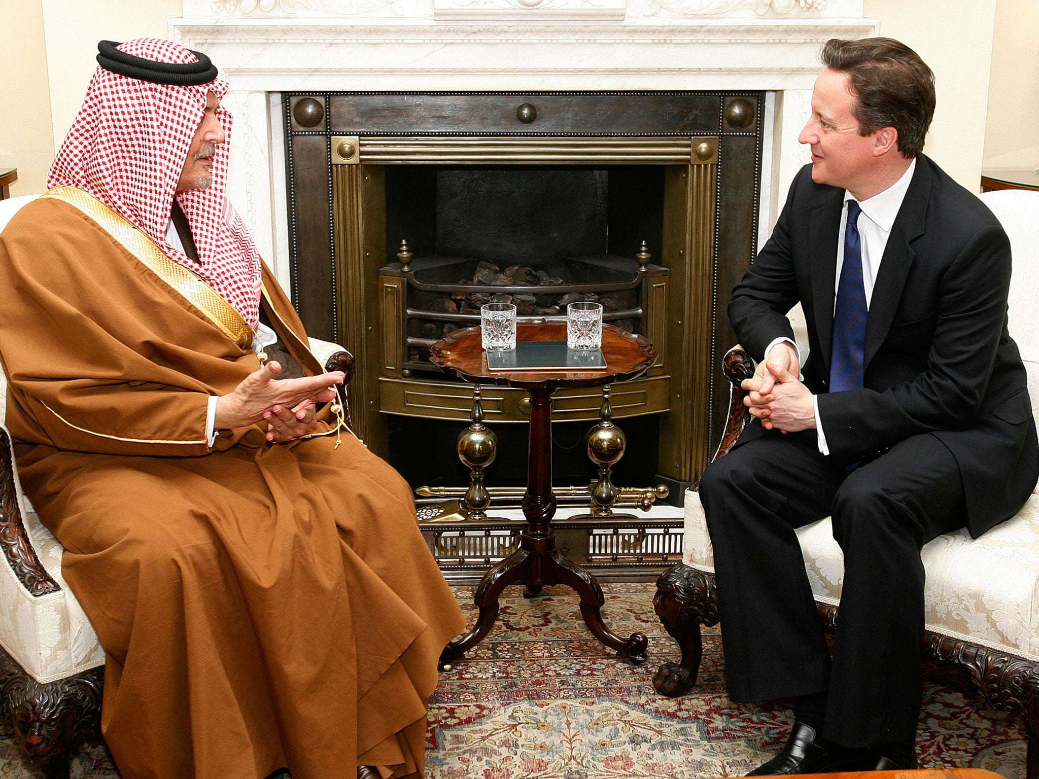 David Cameron talks to Saudi Arabia's former foreign minister Prince Saud Al Faisal