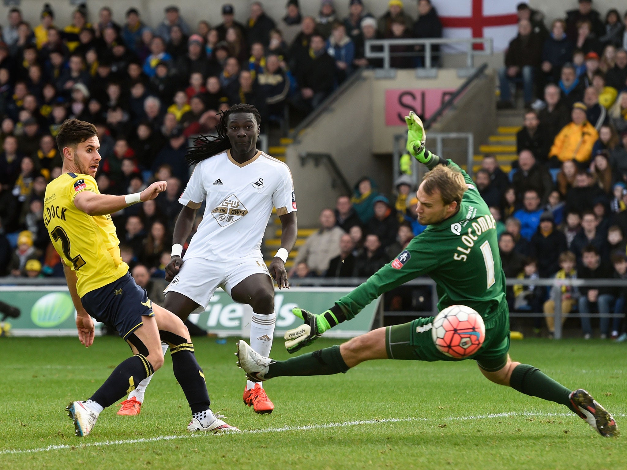 Bafétimbi Gomis, centre, pulls the scoreline back to 3-2 to give Swansea hope