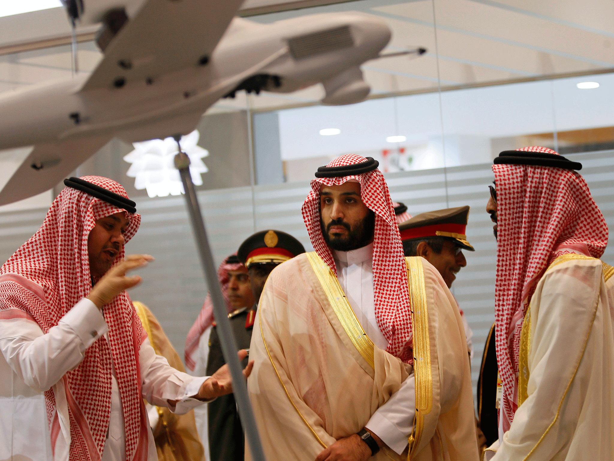 Saudi Defence Minister, deputy crown prince Mohammad bin Salman (C), visits the International Defence Exhibition and Conference (IDEX) in Abu Dhabi February 22, 2015