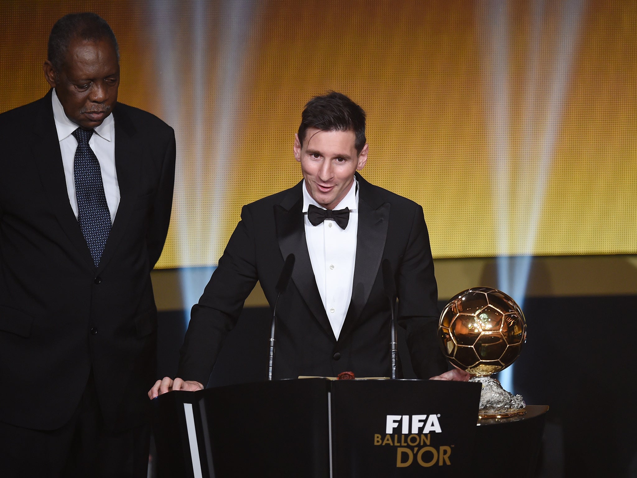 Lionel Messi accepts the Ballon d'Or award