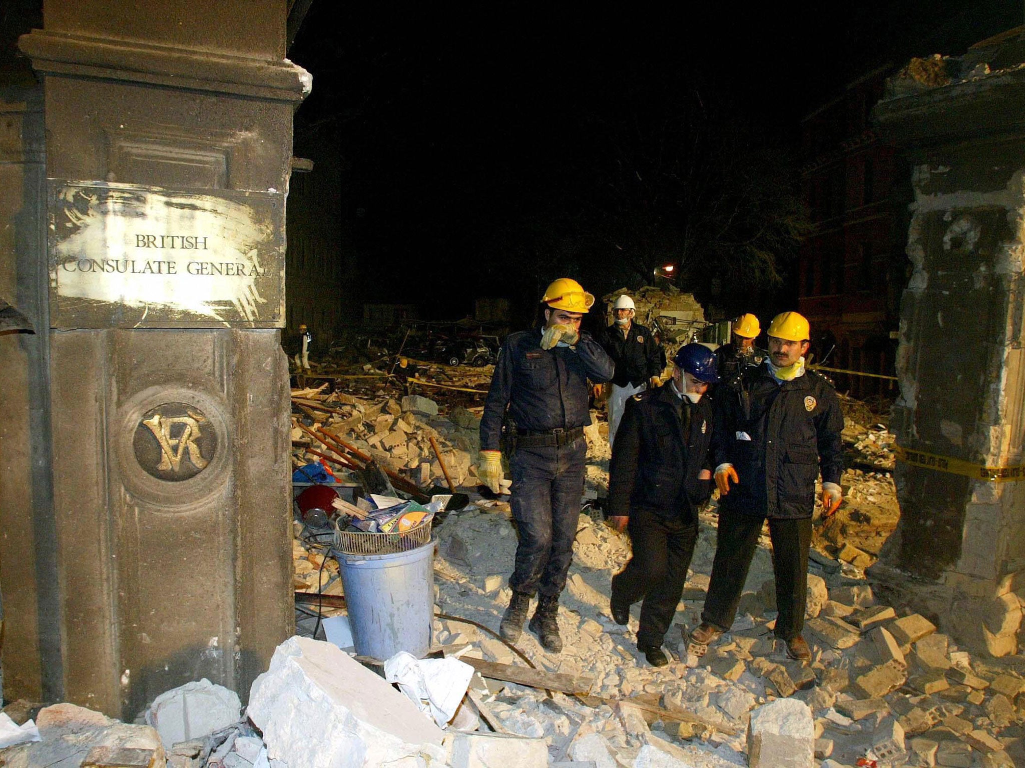 The gatepost to the Britsh Consulate General in Istanbul stands amongst the rubble 20 November 2003 after a bomb killed ten people