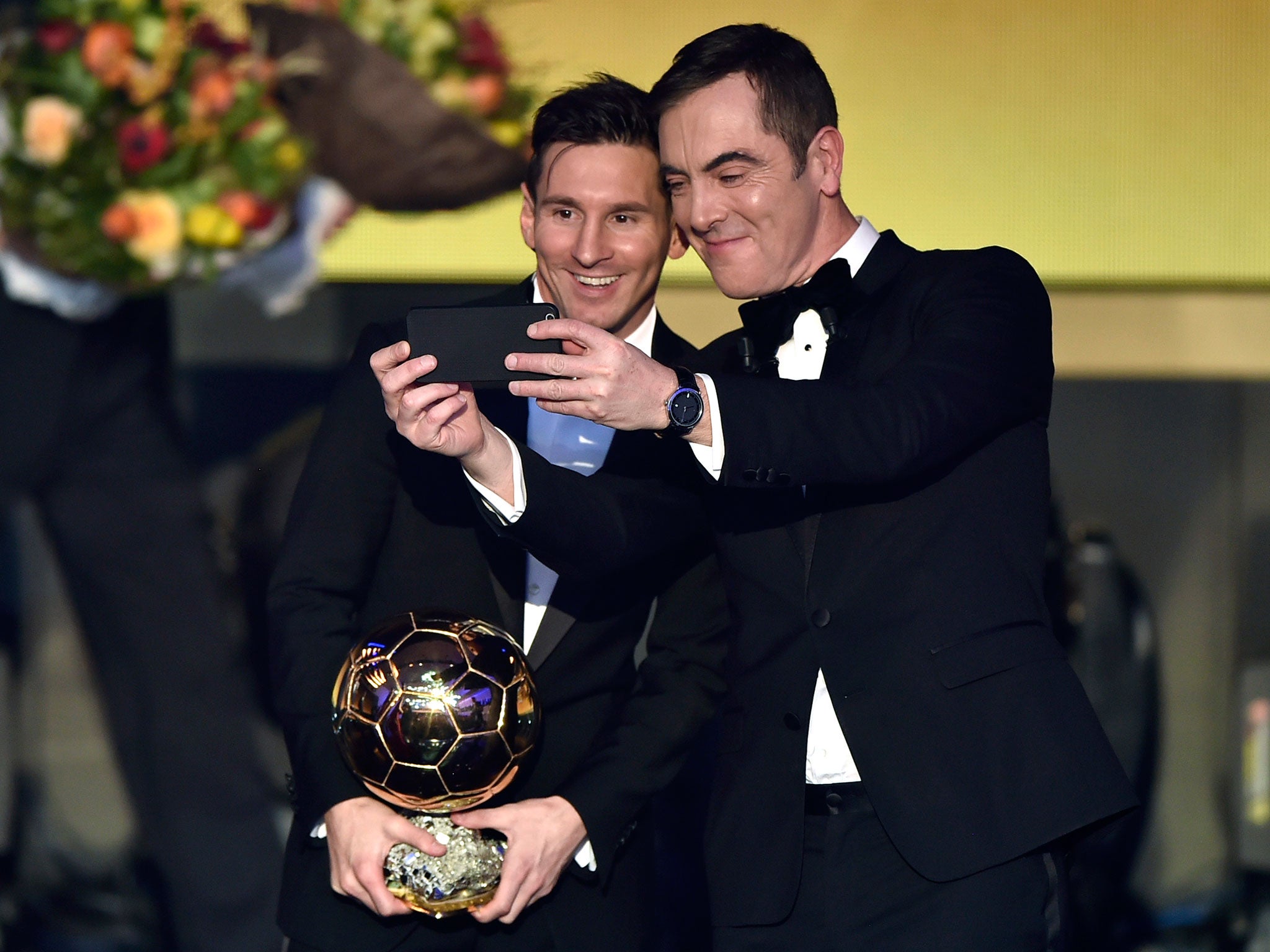 Lionel Messi poses for a selfie with James Nesbitt after winning the Ballon d'Or