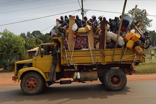 People in the Central Africa Republic often travel in open trucks like the one above