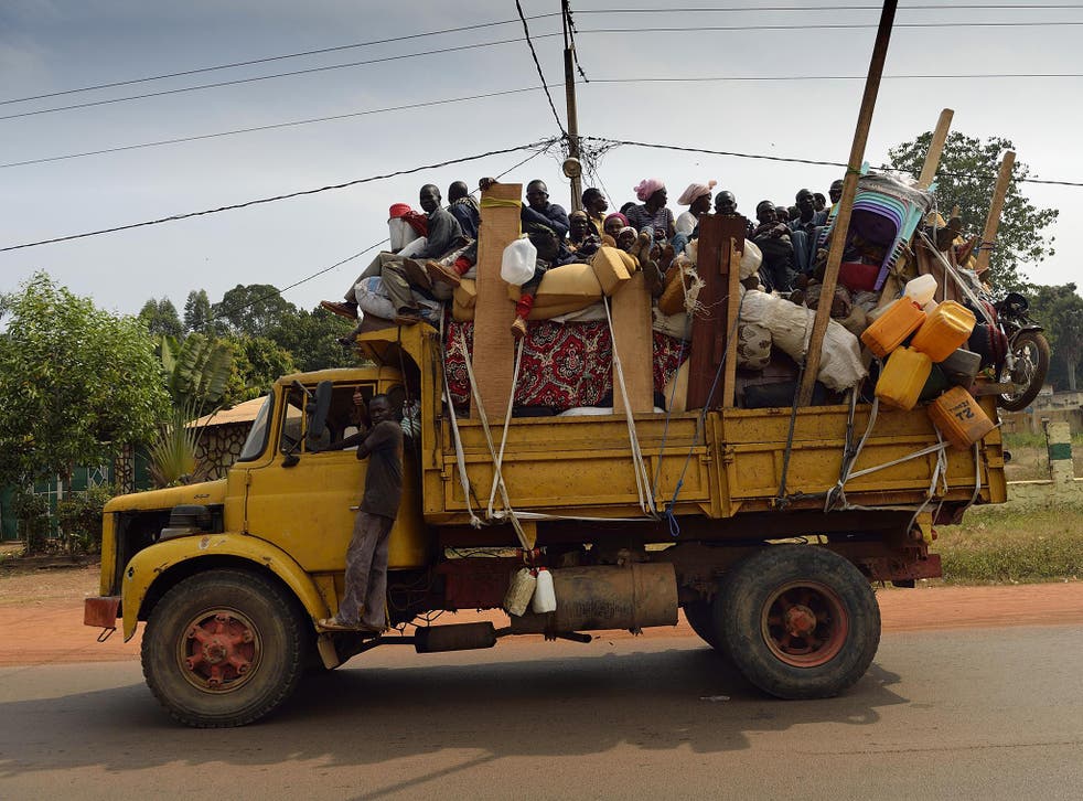 People in the Central Africa Republic often travel in open trucks like the one above