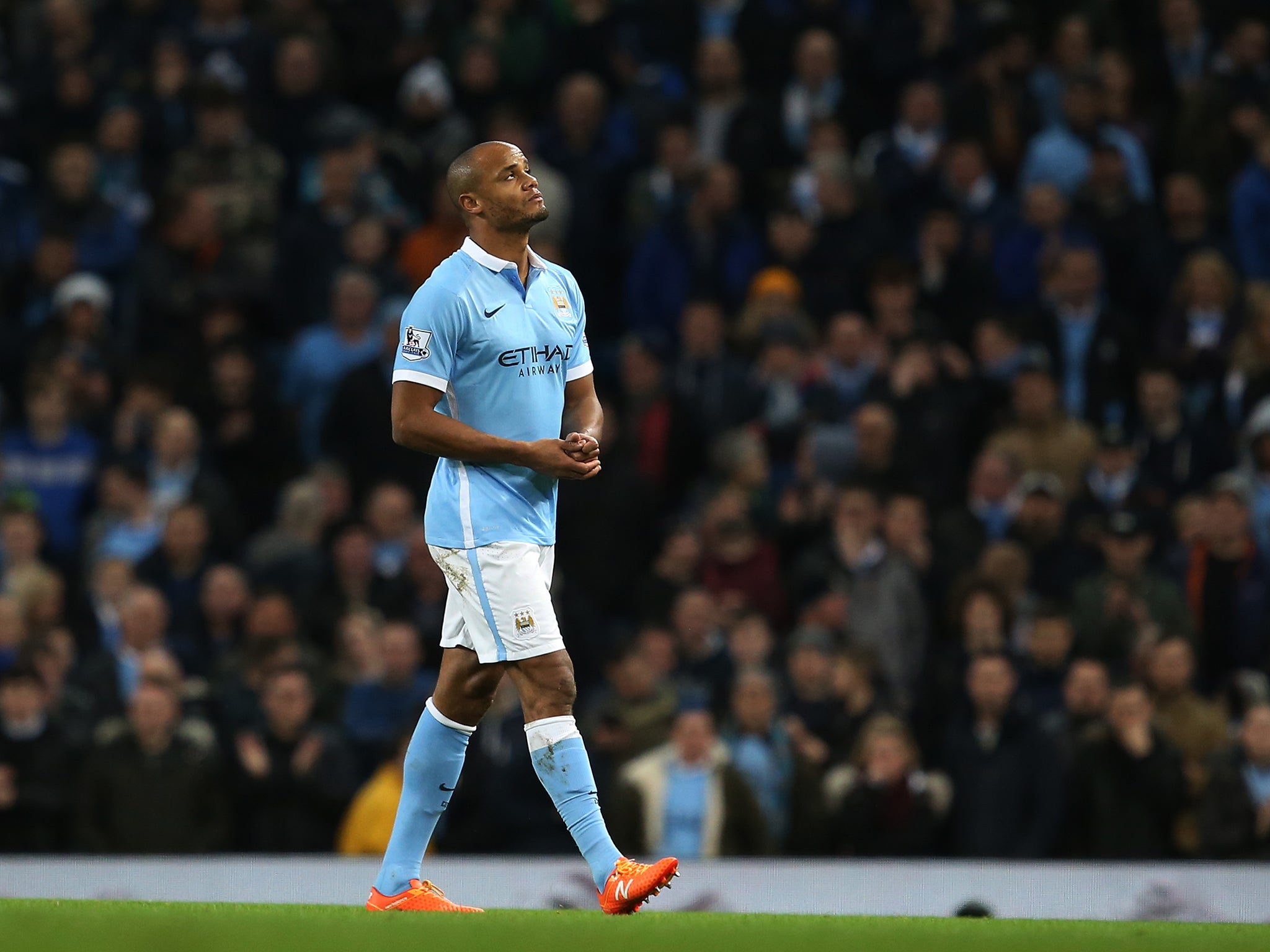 Manchester City defender Vincent Kompany hobbles off after succumbing to a calf injury against Sunderland
