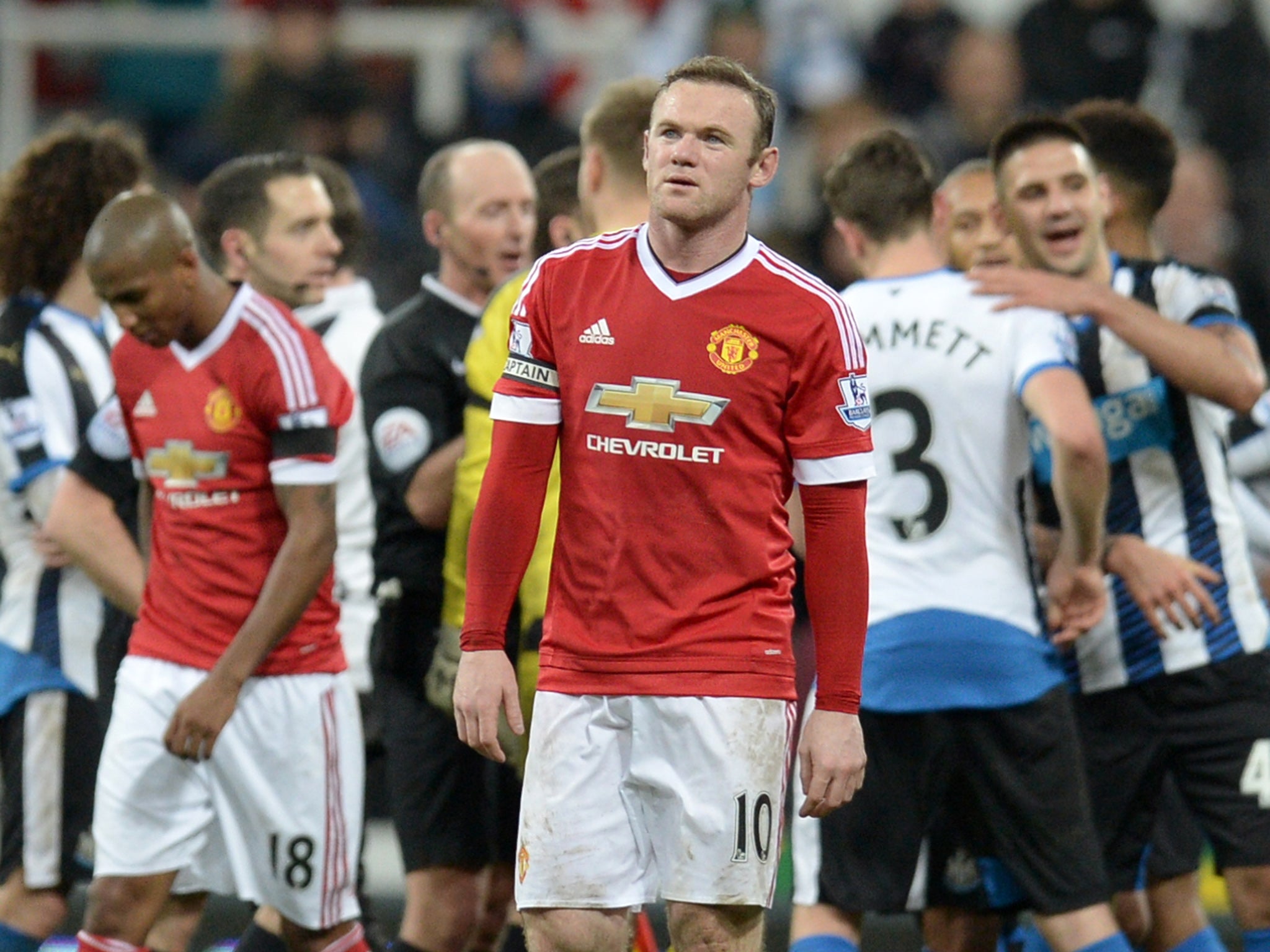 Manchester United striker Wayne Rooney looks on after his side drop two points