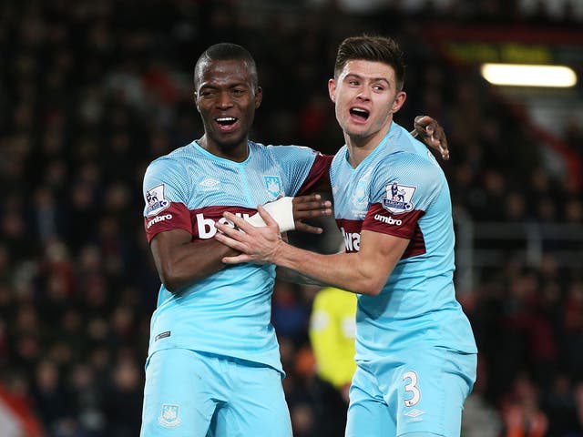 Enner Valencia celebrates his strike with team-mate Aaron Cresswell
