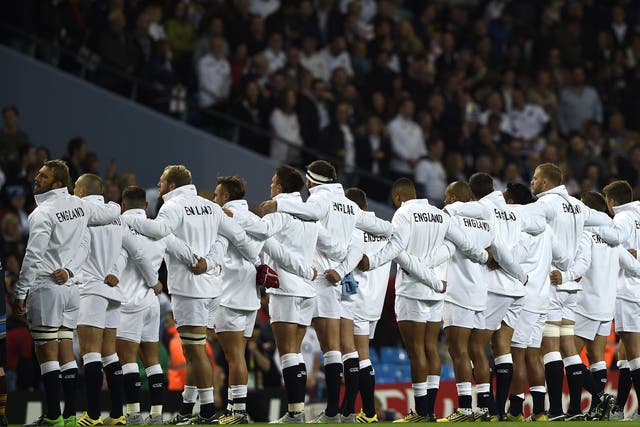 England rugby players line up to sing the national anthem