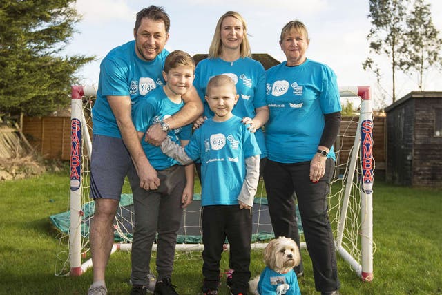 Rowan Pethard with his brother, Corey,10, parents Steve and Abby, grandmother, Sandra Brooke, and Rowan’s dog, Woody