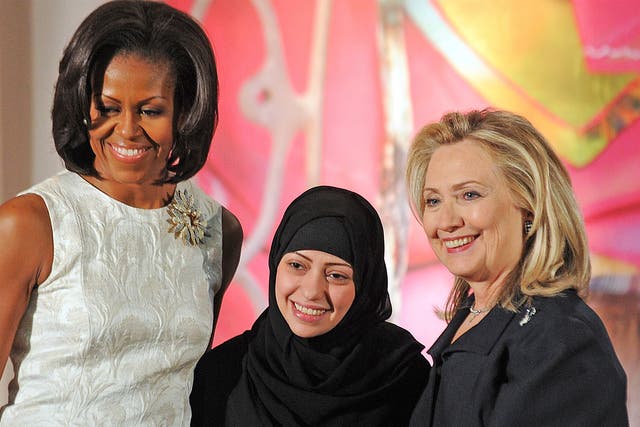 Samar Badawi with Michelle Obama and Hillary Clinton