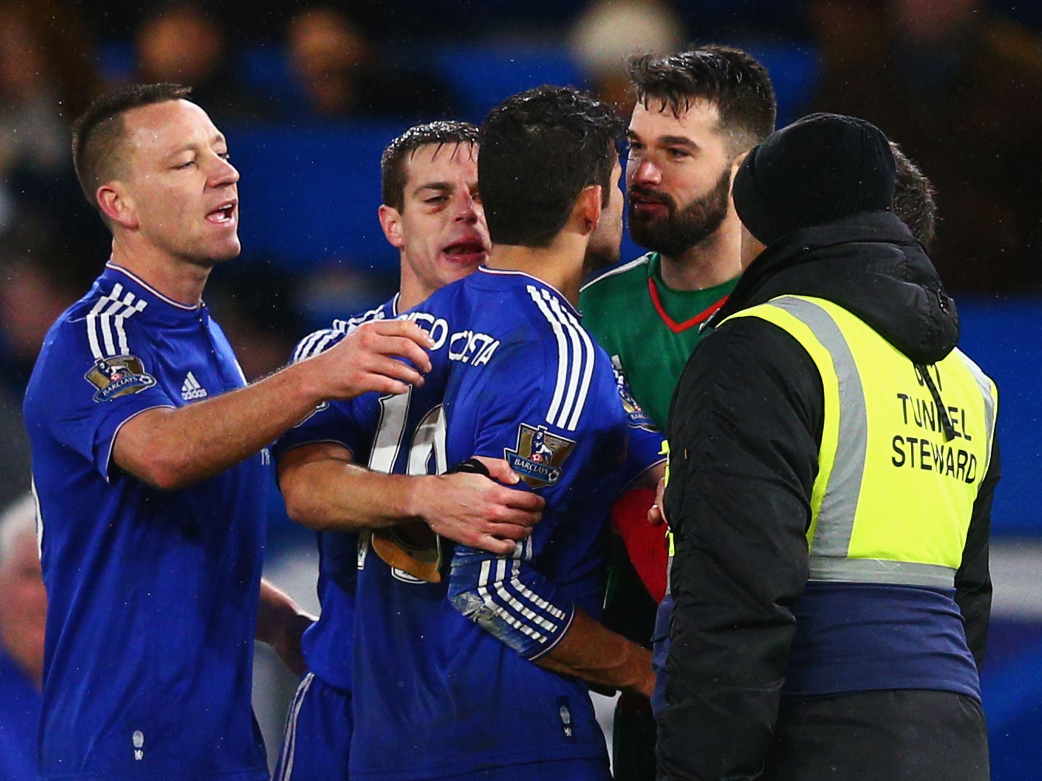 Chelsea striker Diego Costa engages with Boaz Myhill after the final whistle